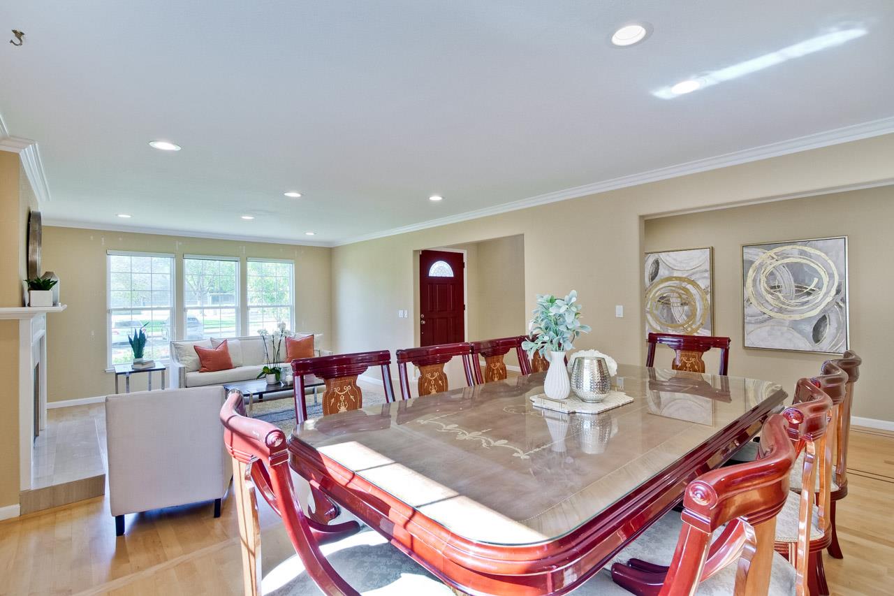 7583 Dumas Drive Cupertino, CA 95014 - Photo 13 of 81 a living room with dining room and wooden floor