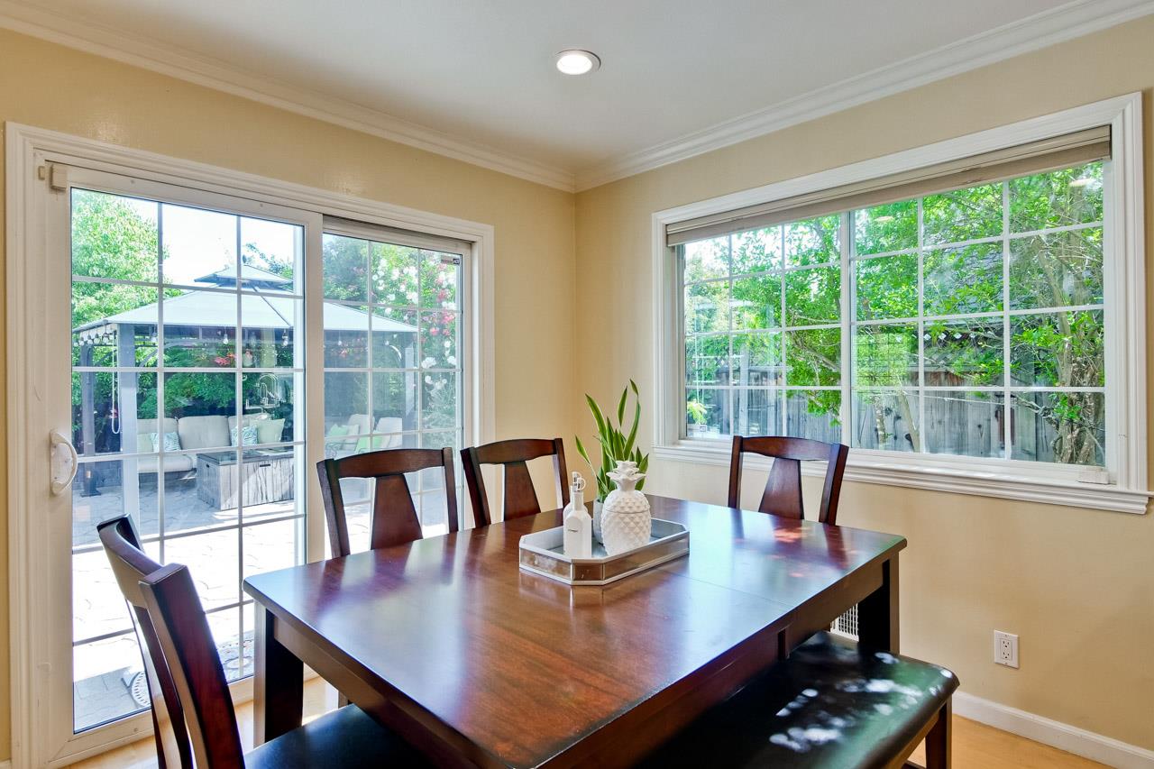 7583 Dumas Drive Cupertino, CA 95014 - Photo 21 of 81 a view of a dining room with furniture window and outside view