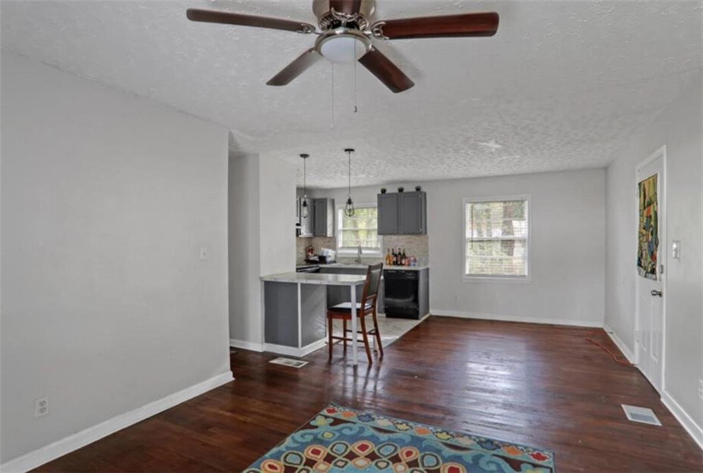 437 Fairlock Lane Northwest Atlanta, GA 30331 - Photo 14 of 26 a view of a livingroom with furniture wooden floor and window