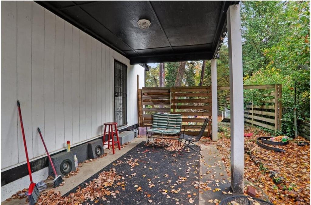 437 Fairlock Lane Northwest Atlanta, GA 30331 - Photo 22 of 26 a view of a porch with furniture