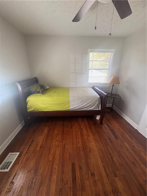 437 Fairlock Lane Northwest Atlanta, GA 30331 - Photo 10 of 26 a room with wooden floor and window