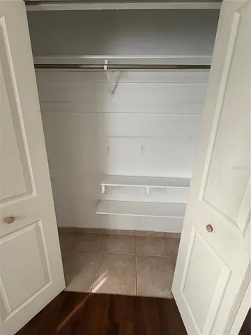 a kitchen with a sink and a refrigerator