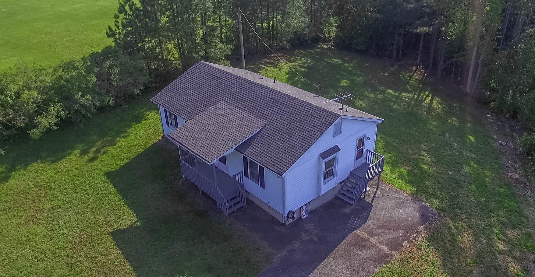 4879 Truevine Road Glade Hill, VA 24092 - Photo 22 of 25 a aerial view of a house with a yard