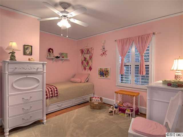 2909 Clover Road Charlotte, NC 28211 - Photo 12 of 16 a bedroom with a bed and furniture