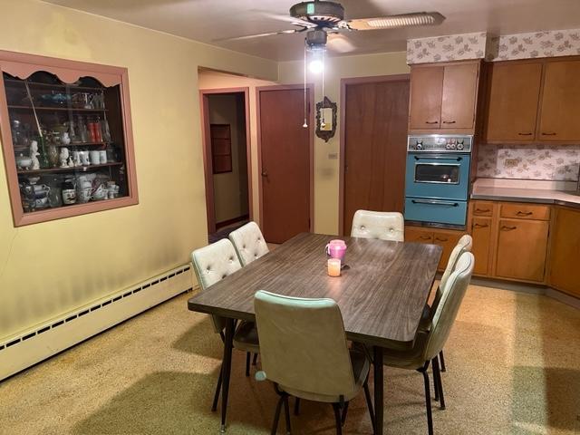 1900 South Roselle Road Roselle, IL 60172 - Photo 4 of 9 a dining room with furniture and window