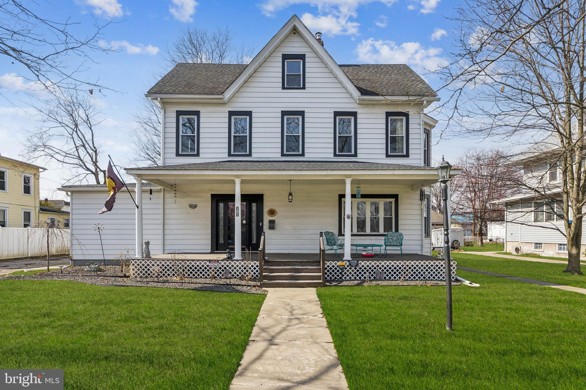 619 Morgan Avenue Palmyra, NJ 08065 - Photo 1 of 27 a front view of a house with a yard