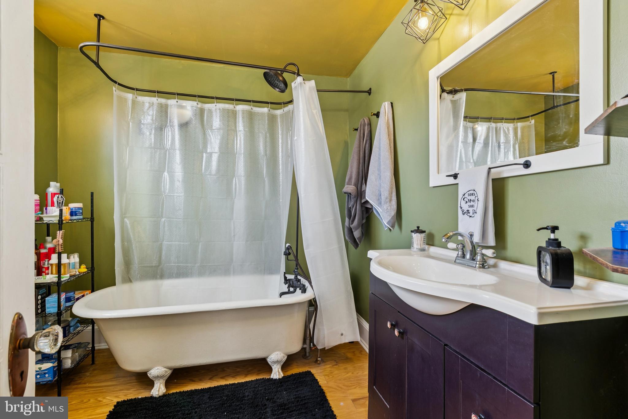 619 Morgan Avenue Palmyra, NJ 08065 - Photo 10 of 27 a bathroom with a sink and a mirror