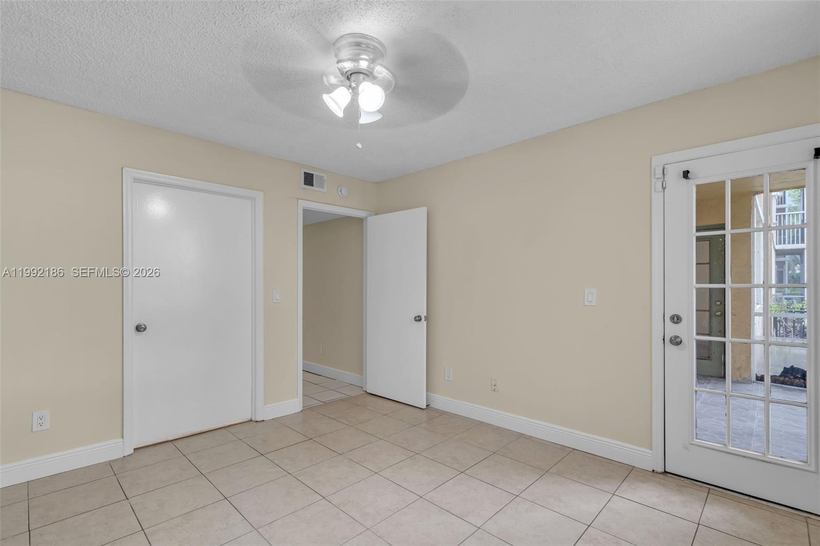 4035 West McNab Road, Unit F101 Pompano Beach, FL 33069 - Photo 17 of 25 a view of an empty room