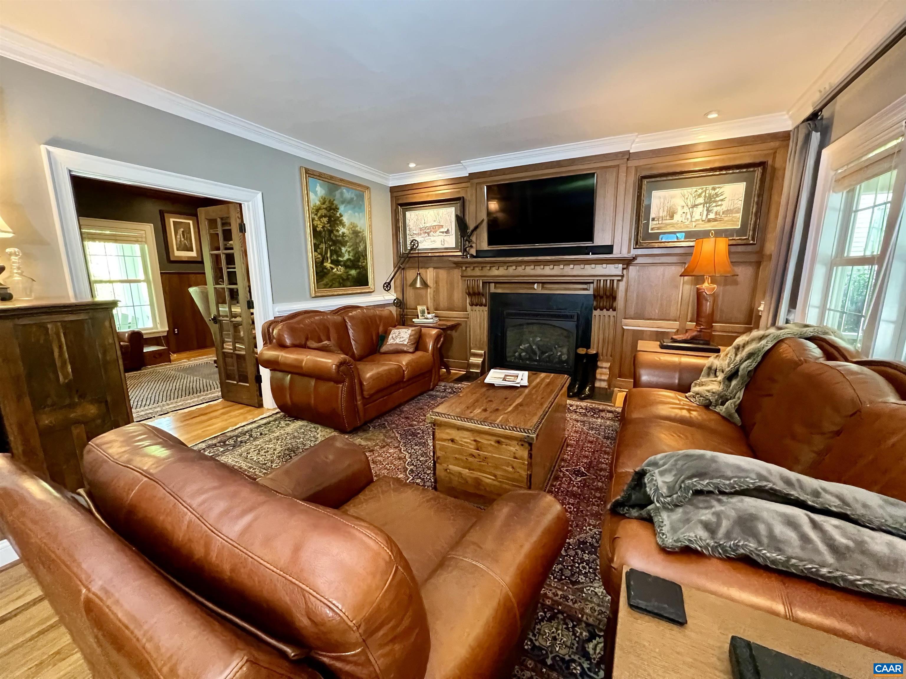1340 Mosby Rch Charlottesville, VA 22901 - Photo 17 of 62 a living room with furniture fireplace and a flat screen tv