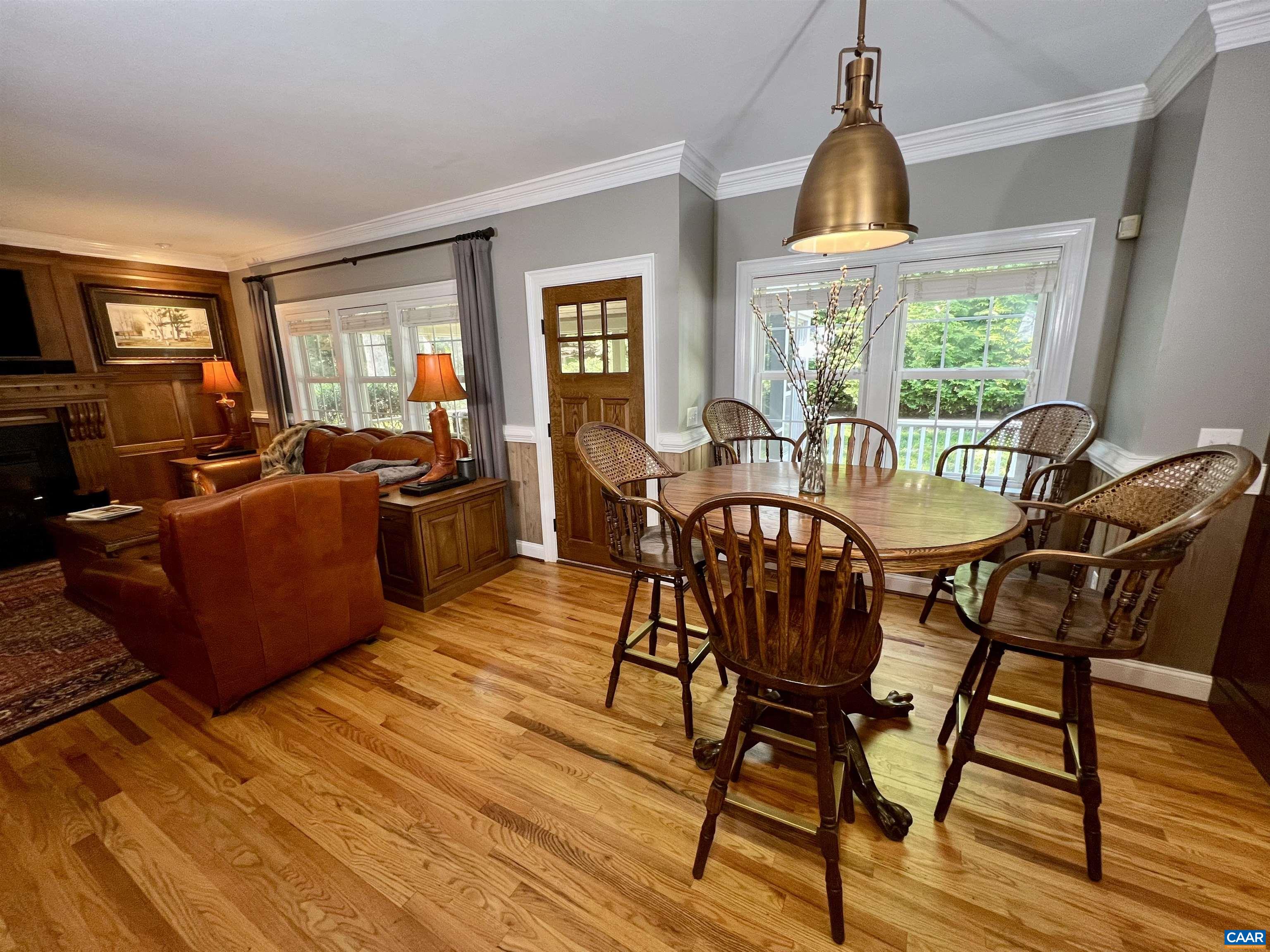 1340 Mosby Rch Charlottesville, VA 22901 - Photo 26 of 62 a view of a dining room with furniture window and wooden floor