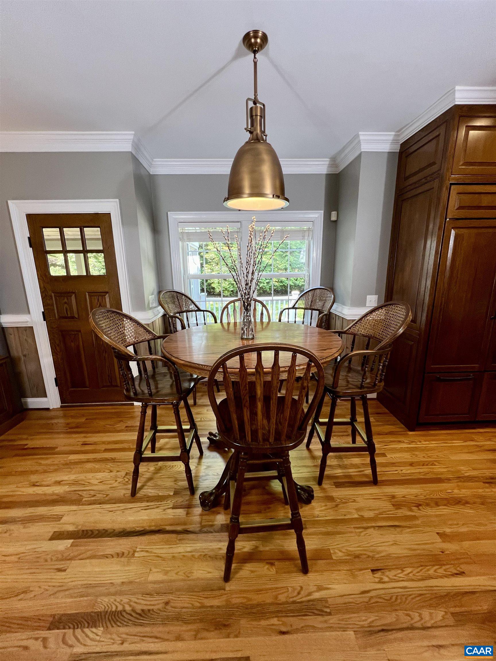 1340 Mosby Rch Charlottesville, VA 22901 - Photo 27 of 62 a view of a dining room with furniture window and wooden floor