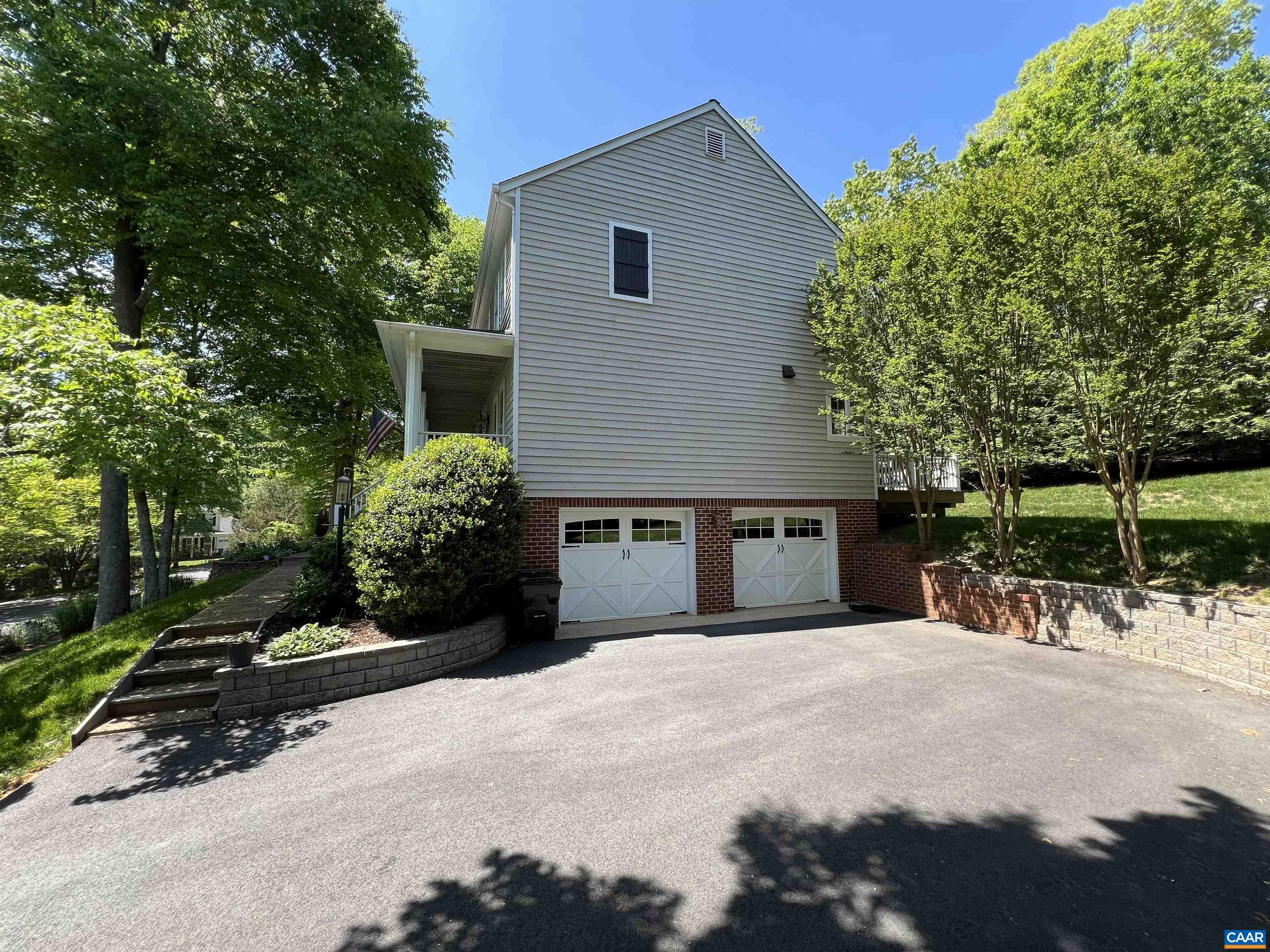 1340 Mosby Rch Charlottesville, VA 22901 - Photo 3 of 62 a front view of a house with a yard