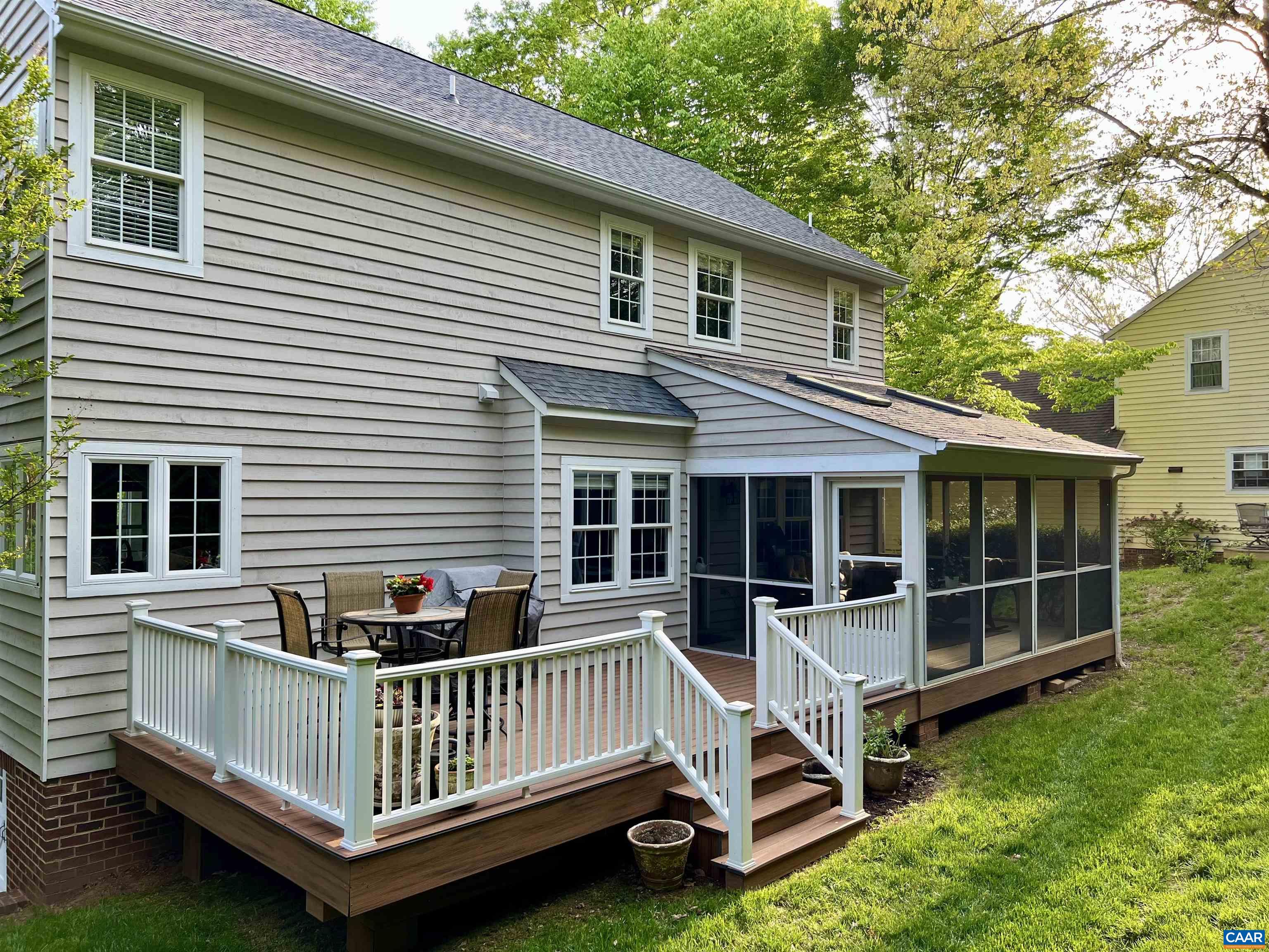 1340 Mosby Rch Charlottesville, VA 22901 - Photo 4 of 62 a view of a house with a yard and a wooden deck
