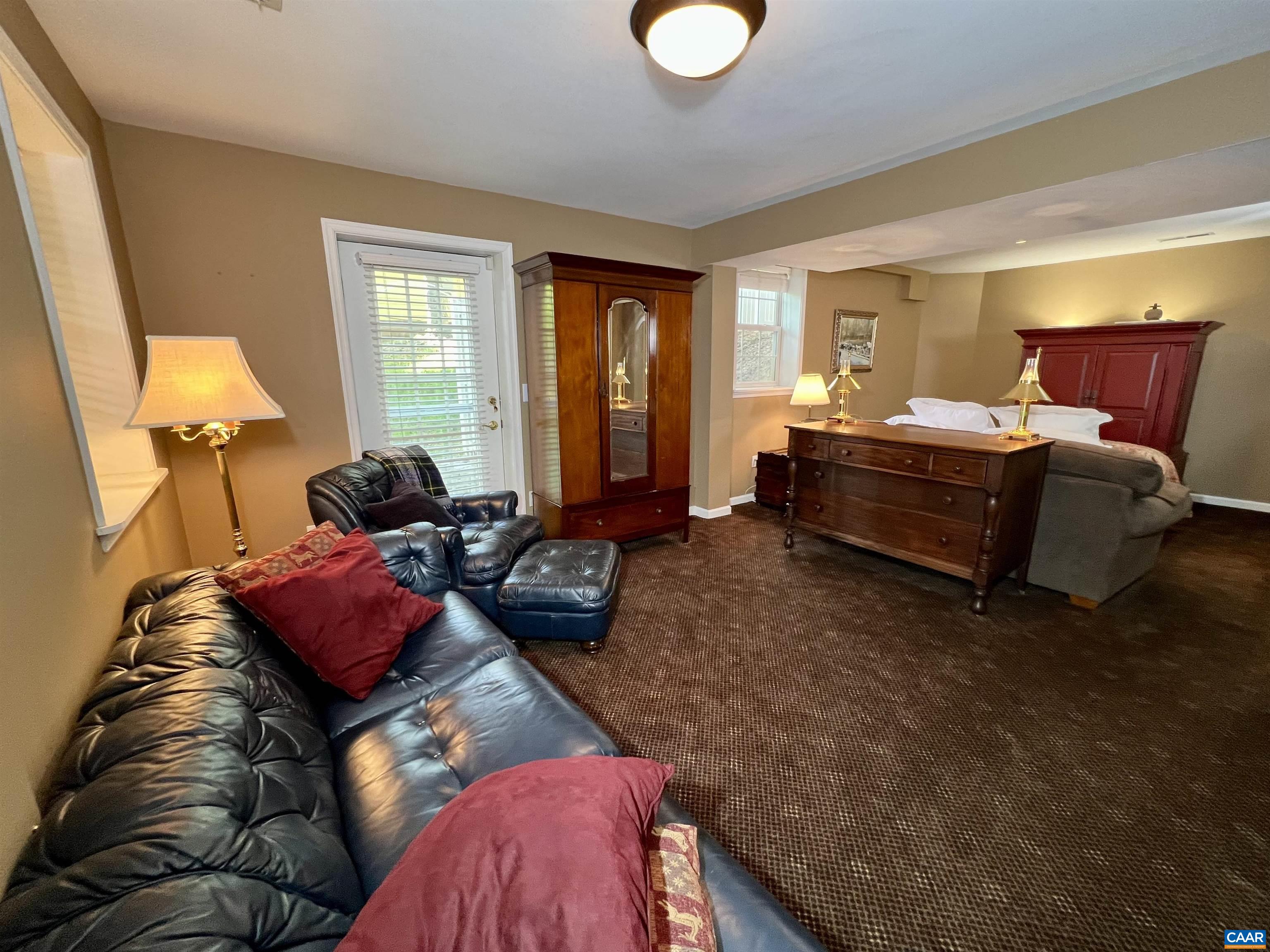 1340 Mosby Rch Charlottesville, VA 22901 - Photo 47 of 62 a spacious bedroom with a bed and window
