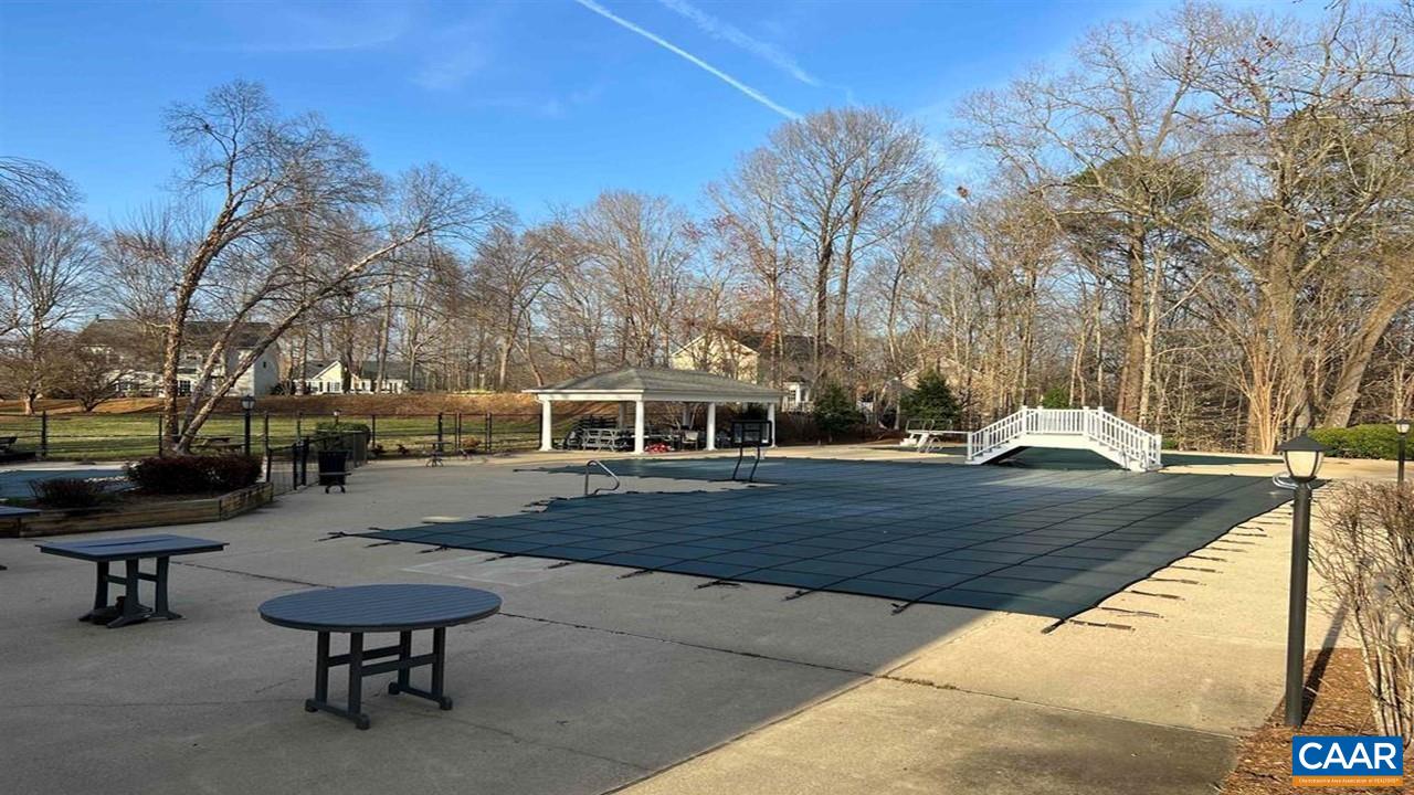 1340 Mosby Rch Charlottesville, VA 22901 - Photo 59 of 62 a view of a backyard with sitting area
