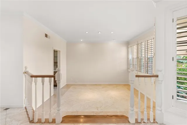 a view of hallway with stairs