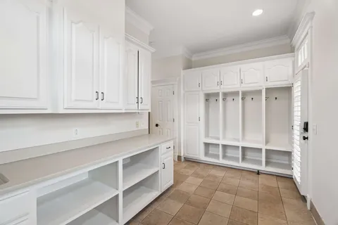 wooden floor and white walls