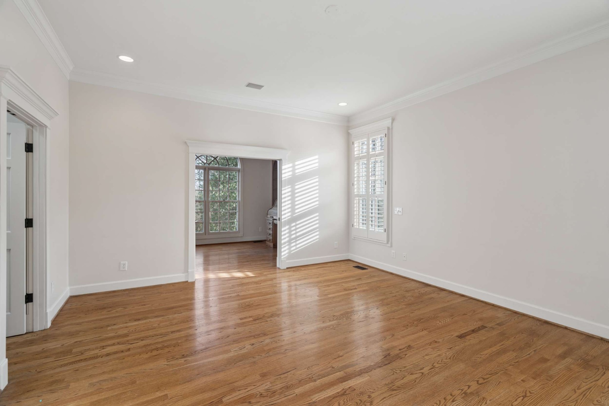 324 East Kingston Springs Road Kingston Springs, TN 37082 - Photo 32 of 86 a view of an empty room with wooden floor and windows