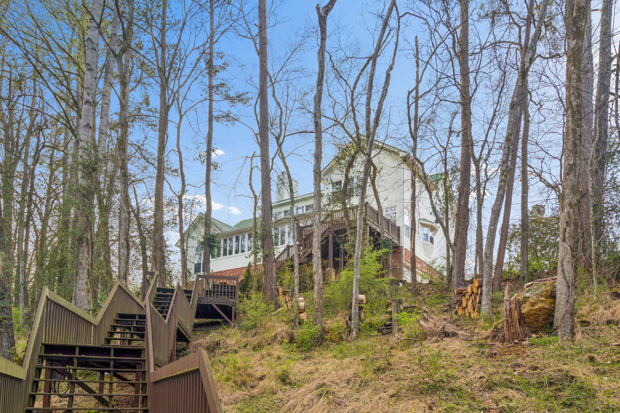 324 East Kingston Springs Road Kingston Springs, TN 37082 - Photo 72 of 86 a backyard of a house with lots of trees
