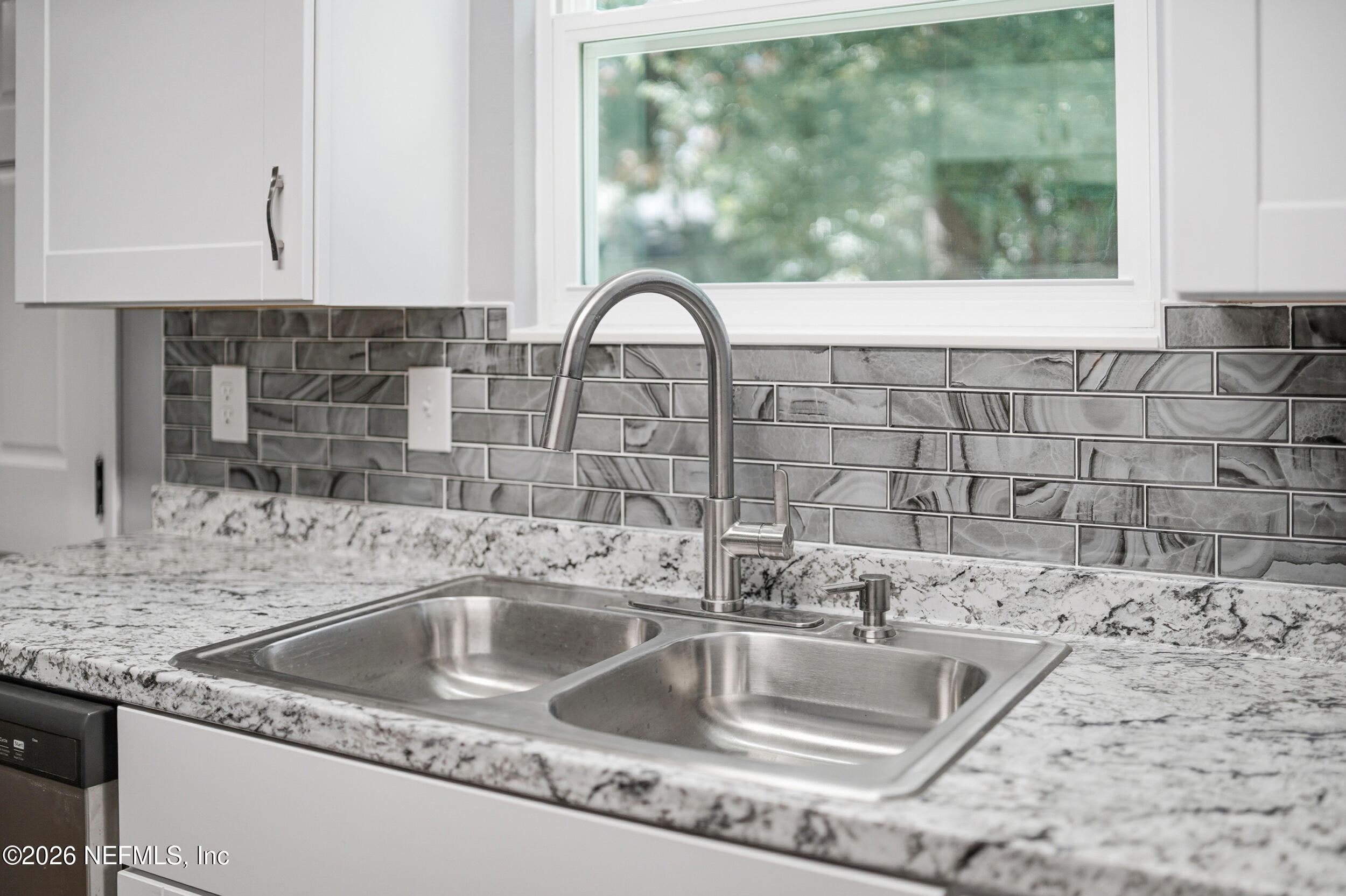 3084 Parental Home Road Jacksonville, FL 32216 - Photo 13 of 31 a close view of sink and tap