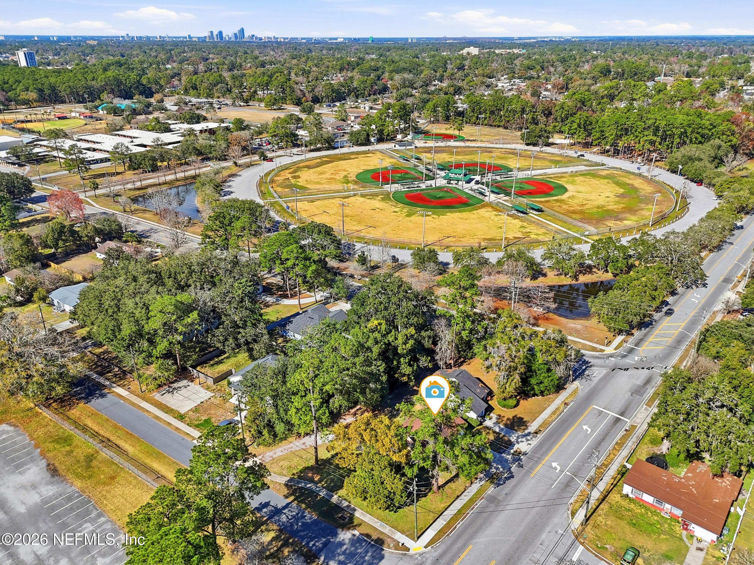 3084 Parental Home Road Jacksonville, FL 32216 - Photo 29 of 31 an aerial view of residential houses with outdoor space