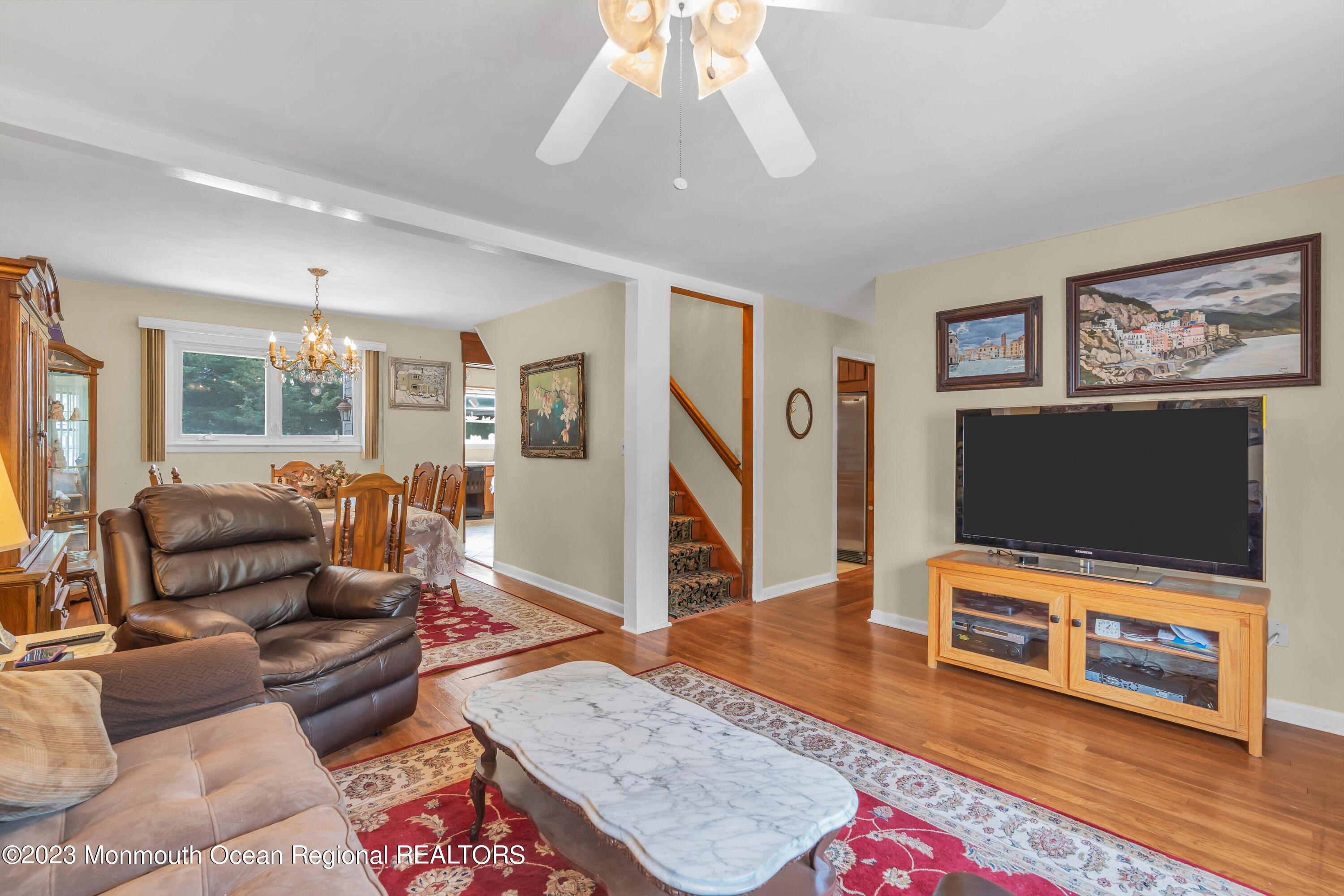 8 Willow Brook Road Freehold, NJ 07728 - Photo 19 of 49 a living room with furniture and a flat screen tv