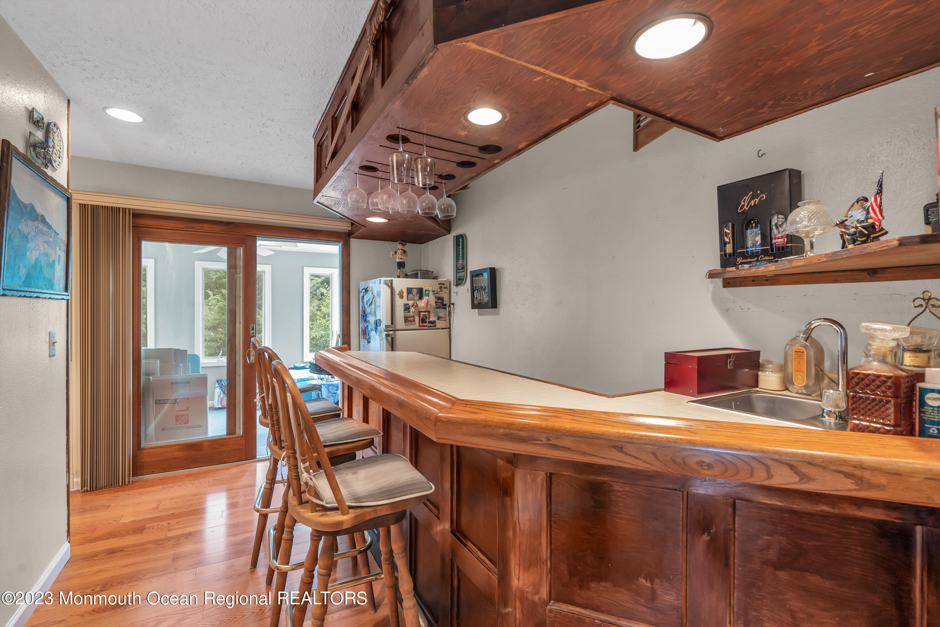8 Willow Brook Road Freehold, NJ 07728 - Photo 2 of 49 a dining room with furniture and a floor to ceiling window