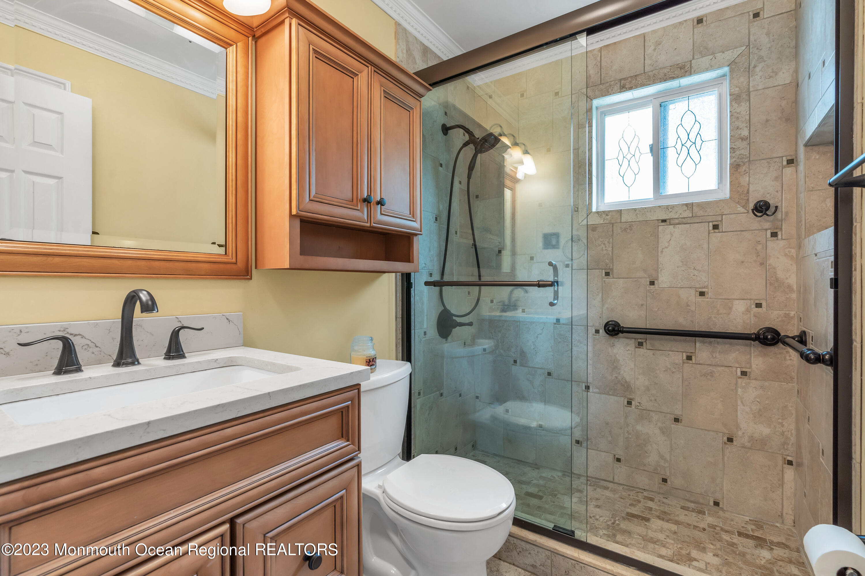 8 Willow Brook Road Freehold, NJ 07728 - Photo 29 of 49 a bathroom with a sink a toilet and shower