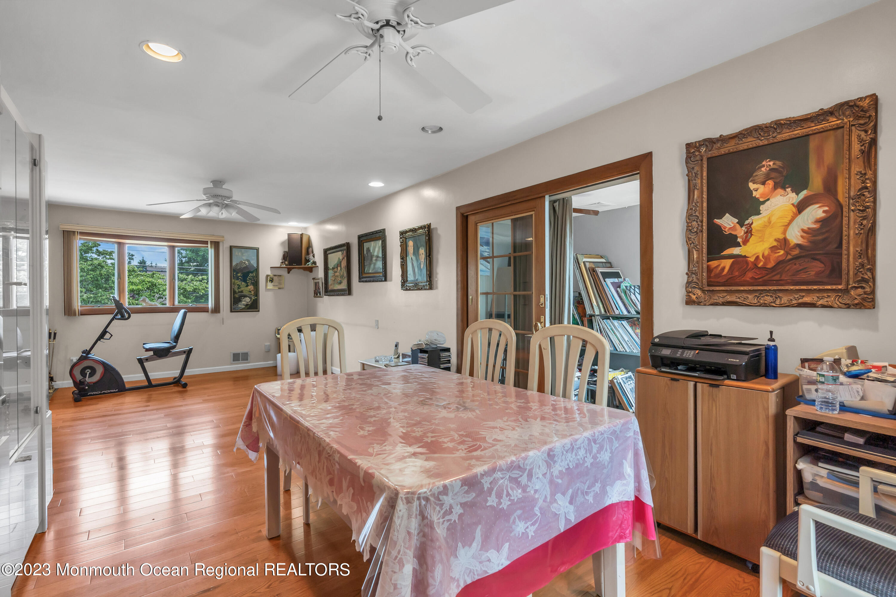 8 Willow Brook Road Freehold, NJ 07728 - Photo 31 of 49 a view of a dining room with furniture window and wooden floor