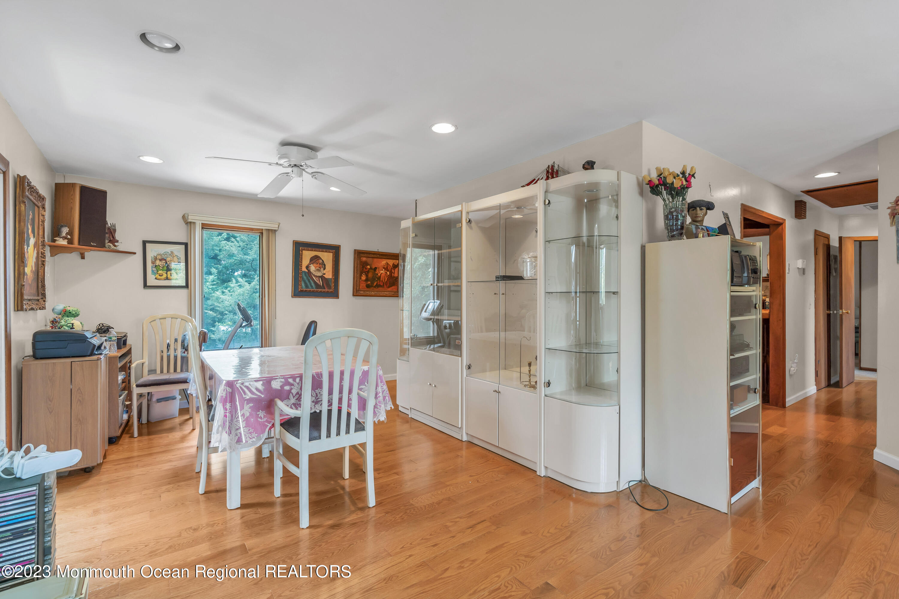 8 Willow Brook Road Freehold, NJ 07728 - Photo 32 of 49 a view of a dining room with furniture window and wooden floor
