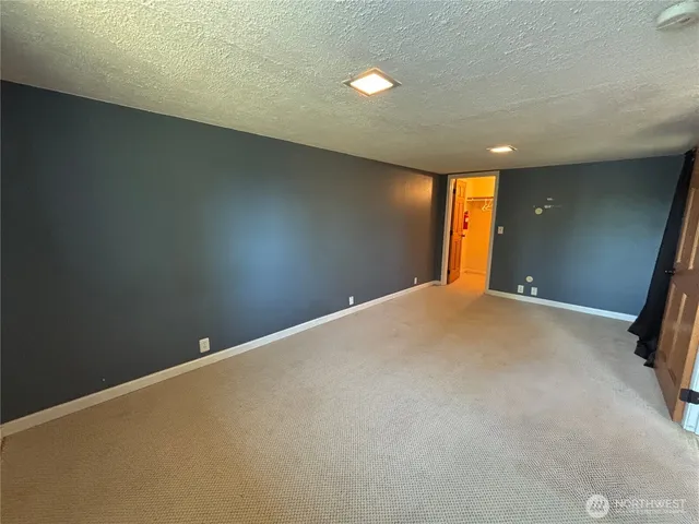 a view of a big room with wooden floor