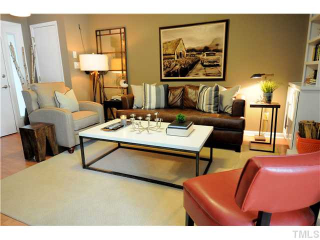 3205 Mill Run Raleigh, NC 27612 - Photo 3 of 22 a living room with furniture and wooden floor