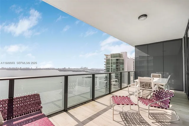 a view of roof deck with furniture