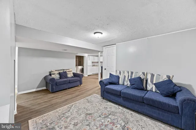 a living room with furniture and a couch