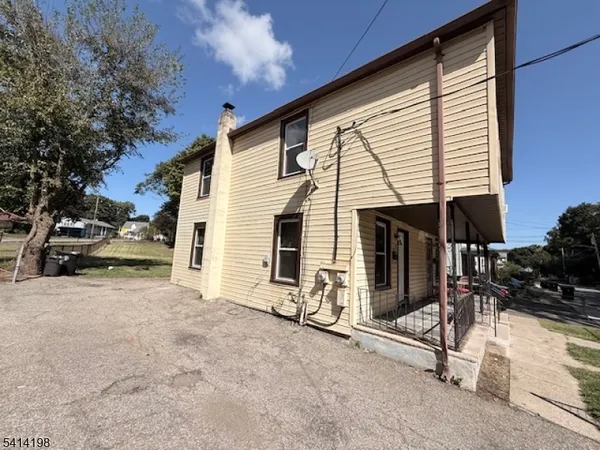 a view of a house with a patio