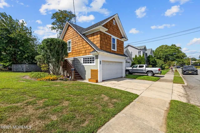 a view of house with swimming pool outdoor seating