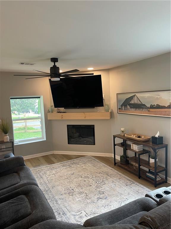 433 Spring Place Resaca Road Chatsworth, GA 30705 - Photo 19 of 51 a living room with furniture and a flat screen tv