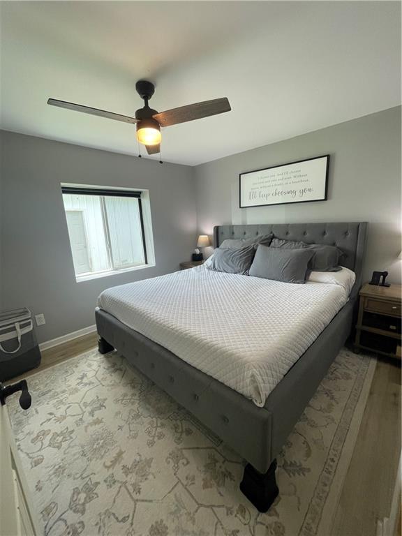 433 Spring Place Resaca Road Chatsworth, GA 30705 - Photo 30 of 51 a bedroom with a bed and window