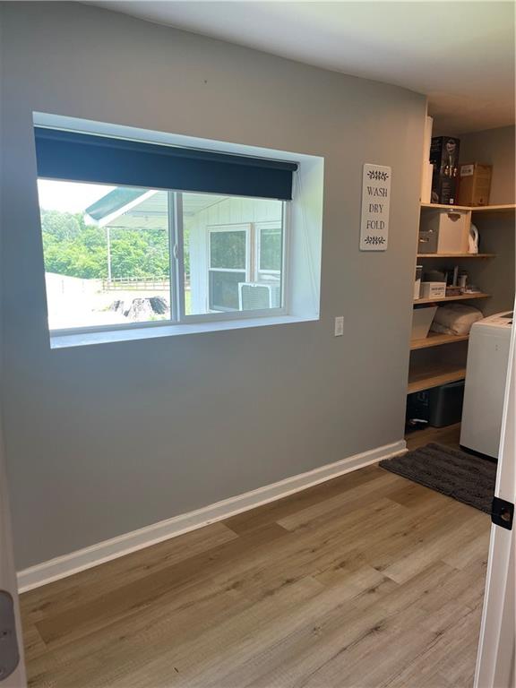 433 Spring Place Resaca Road Chatsworth, GA 30705 - Photo 41 of 51 a workspace with wooden floor and a window
