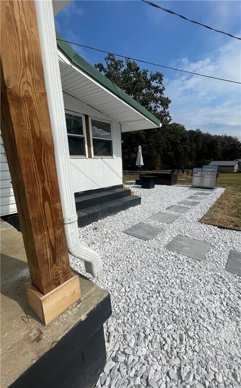 433 Spring Place Resaca Road Chatsworth, GA 30705 - Photo 8 of 51 a front view of a house with a yard