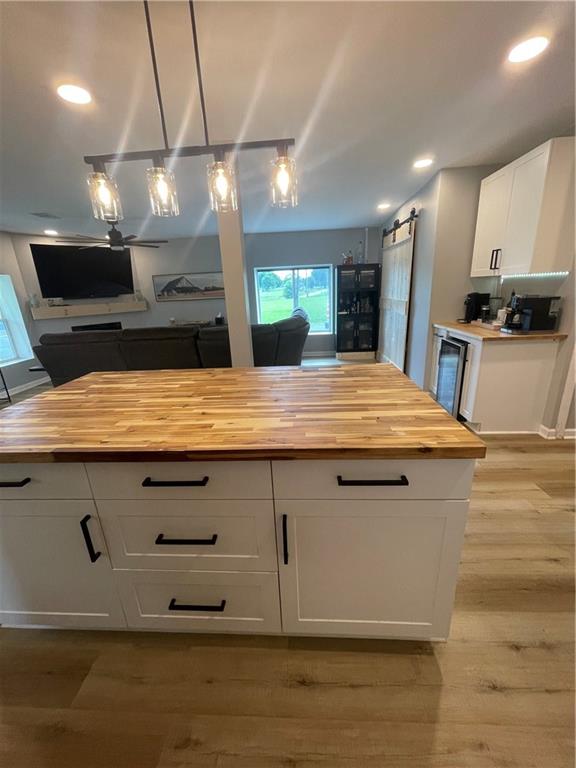 433 Spring Place Resaca Road Chatsworth, GA 30705 - Photo 10 of 51 a view of a kitchen with kitchen island a sink stainless steel appliances and cabinets