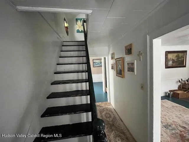 a bedroom with a bed and furniture