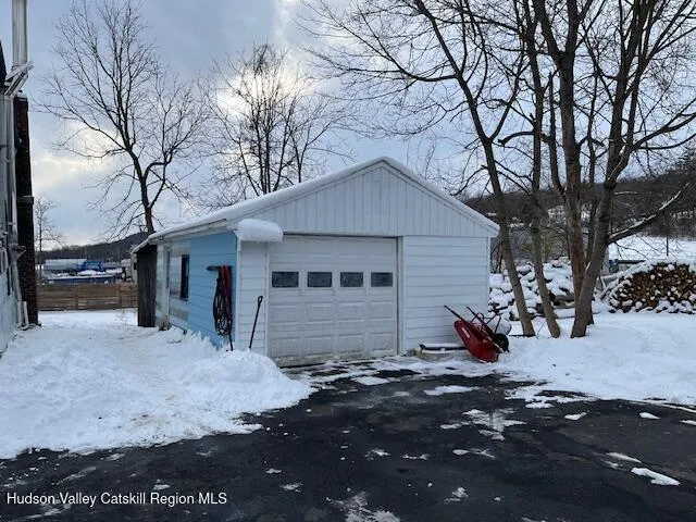 a house with trees in the background