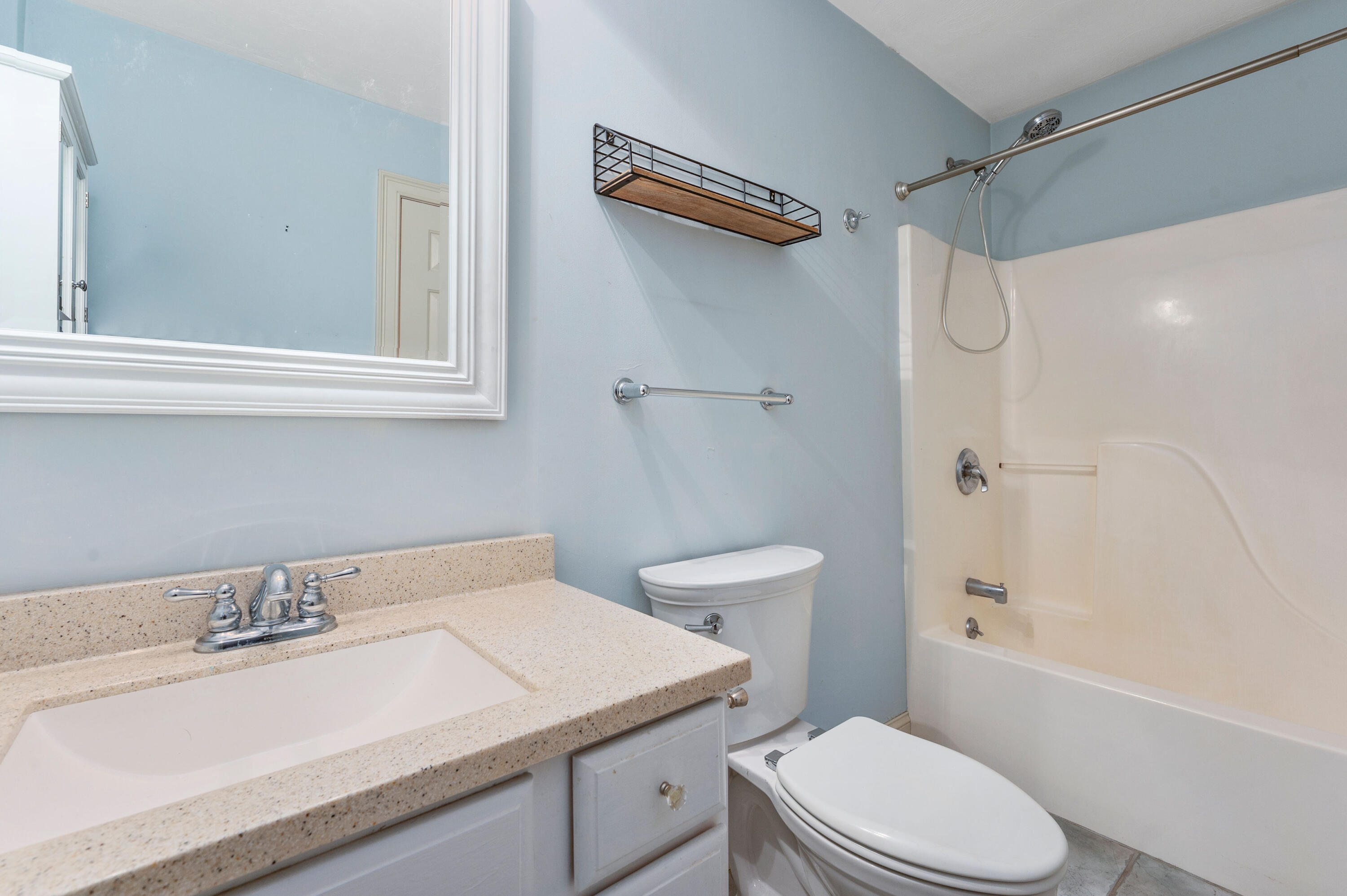 403 Lower County Road, Unit J Harwich Port, MA 02646 - Photo 21 of 26 a bathroom with a sink a toilet and shower