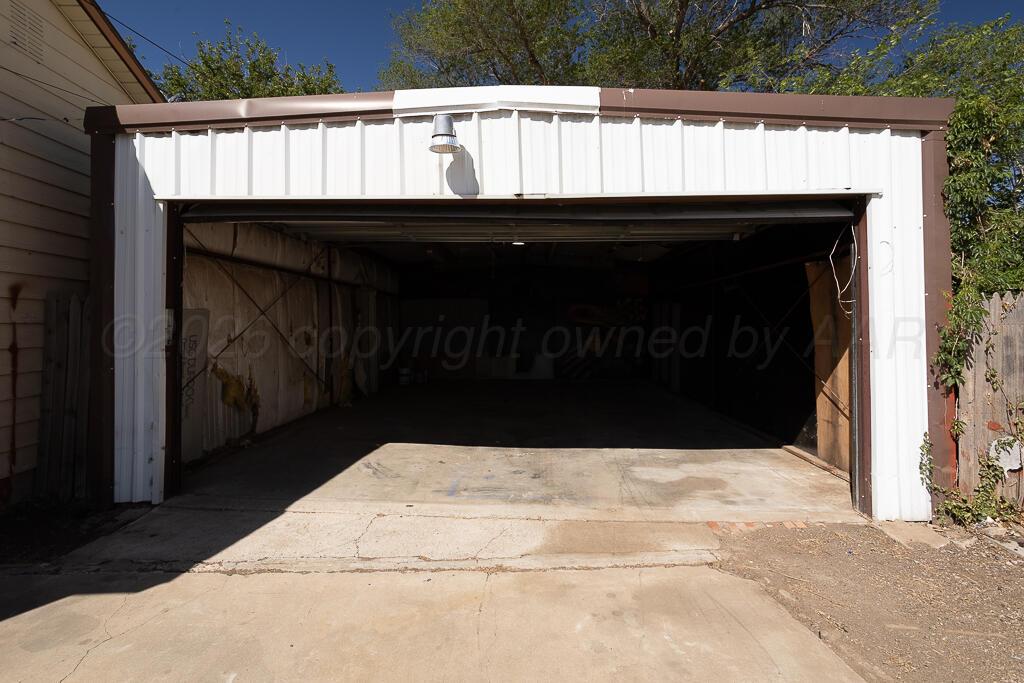 4422 South Ong Street Amarillo, TX 79110 - Photo 12 of 17 a view of entryway with a balcony