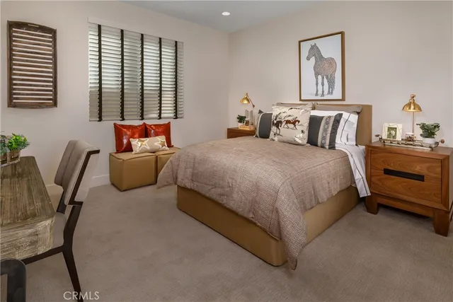 a bedroom with bed and window