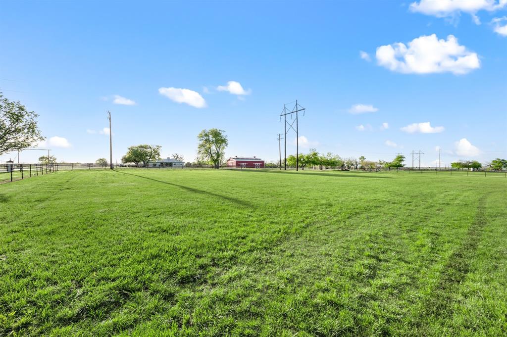 7384 Rector Road Sanger, TX 76266 - Photo 33 of 40 a view of a golf course with a big yard