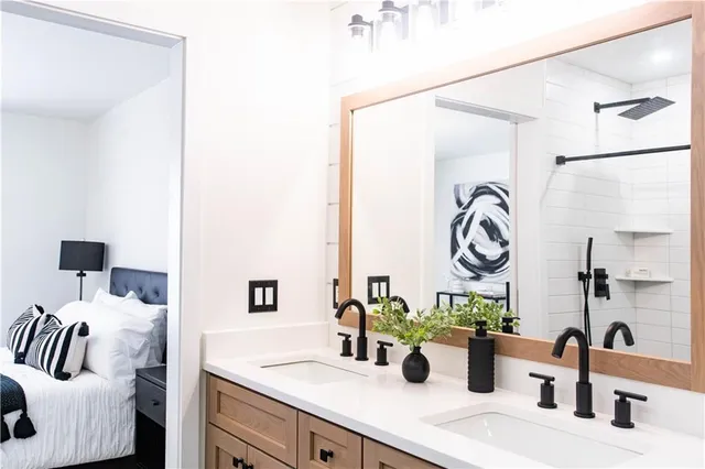a bathroom with a sink and a mirror