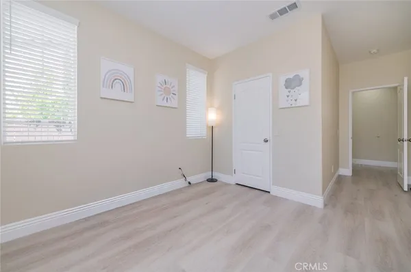 a bathroom with a tub shower and sink