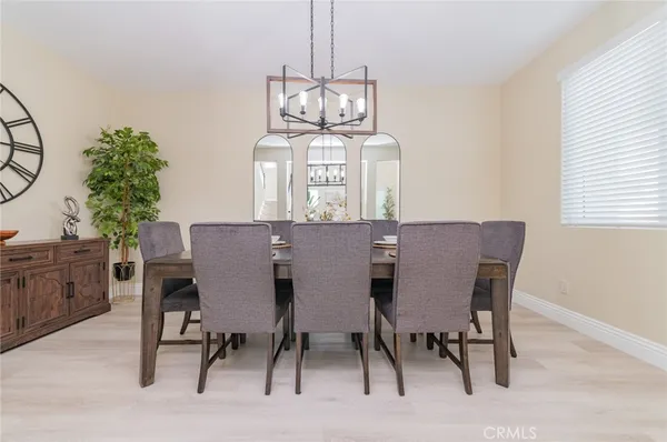 a kitchen with granite countertop a sink and cabinets